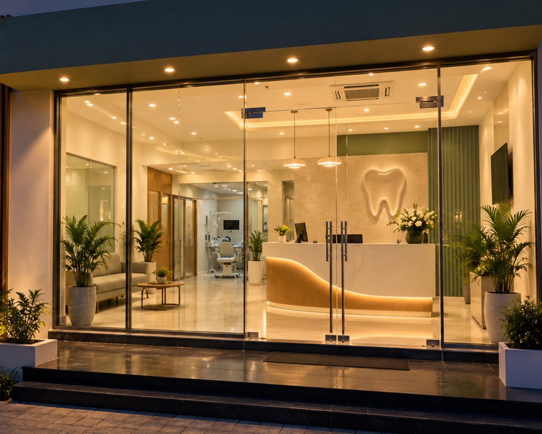 The clinic entrance and reception lit up in the evening